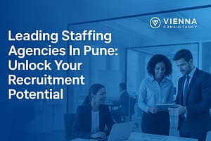 Professionals collaborating in office with text “Leading Staffing Agencies in Pune: Unlock Your Recruitment Potential” by Vienna Consultancy.